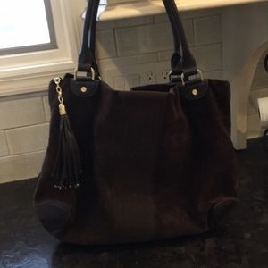 Rich suede with leather and gold details